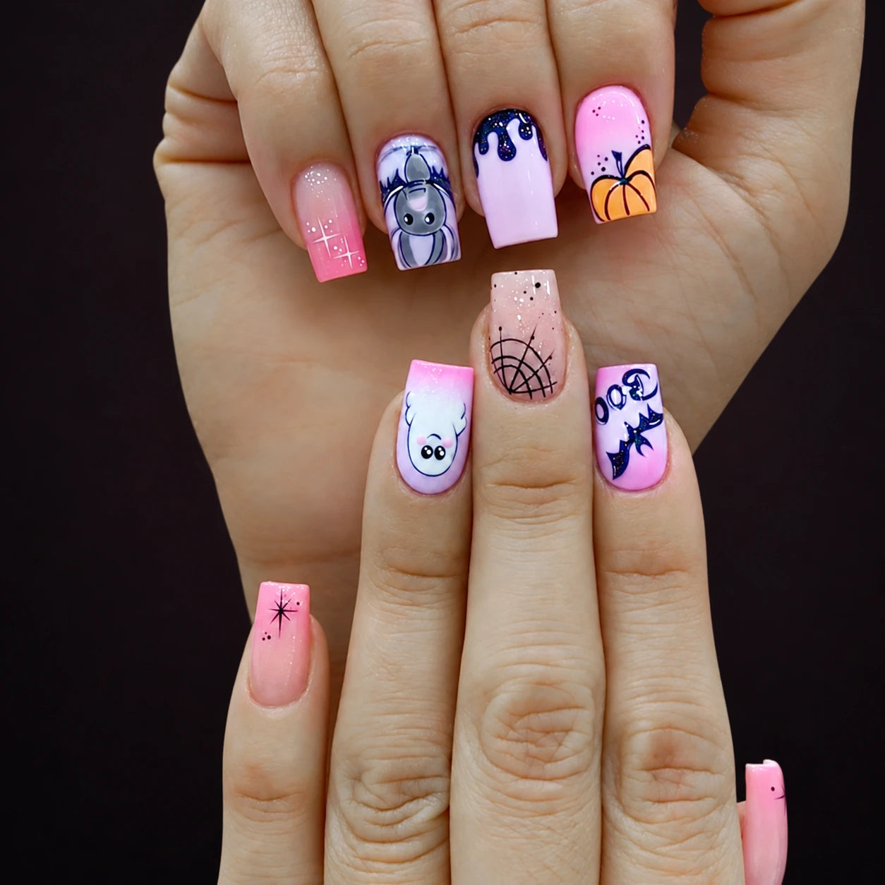 Pastel pink and lilac Halloween nails; AI-styled product photograph